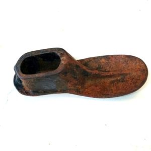 Vintage shoe mold/stretcher from 1900s. Has size 1 on it. Cast iron, metal.